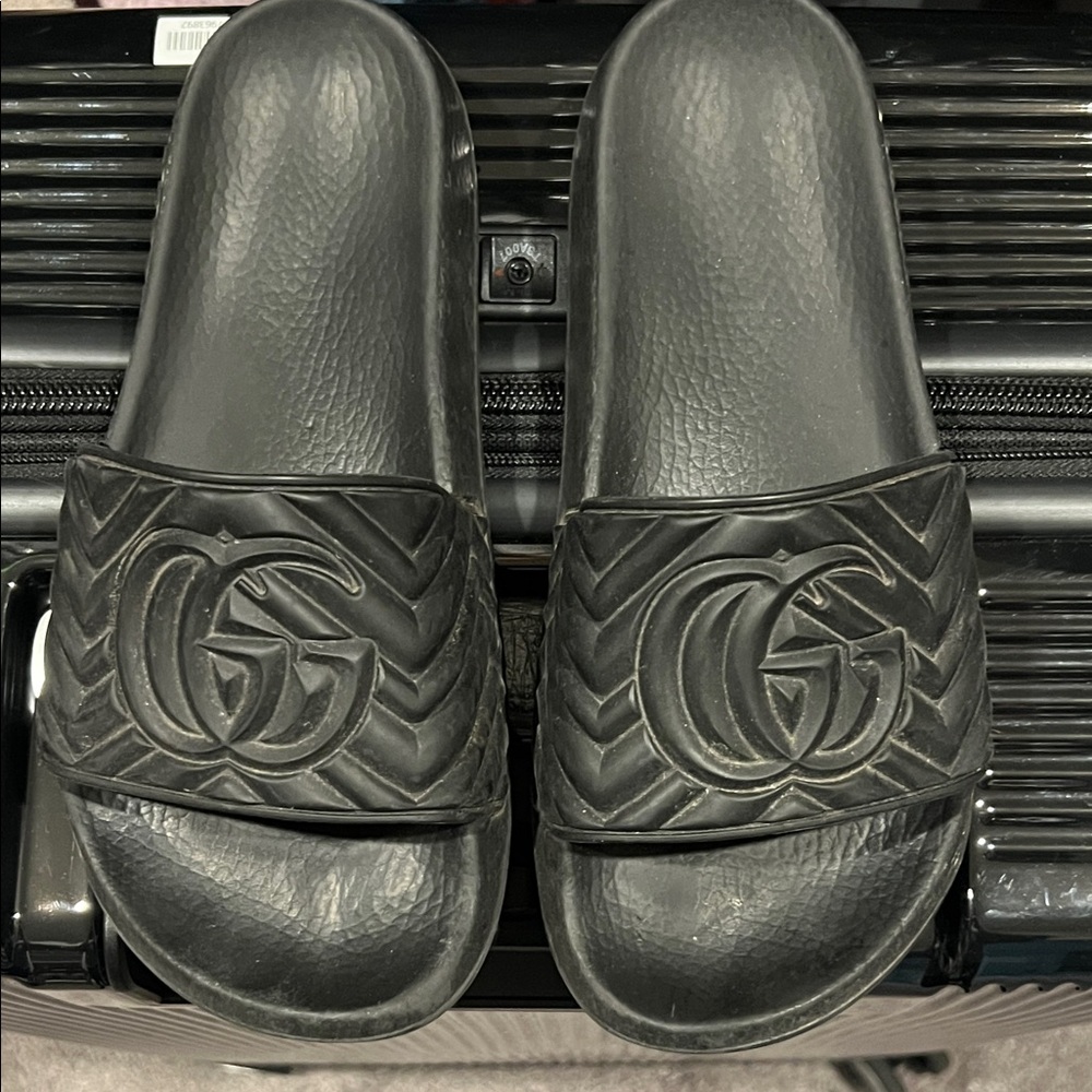 Gucci Embossed Black Slides in good condition